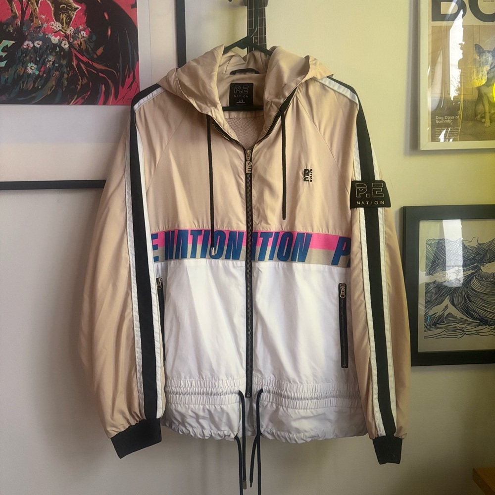 P.E Nation Hooded Windbreaker in Beige, White & Pink/Blue Logo